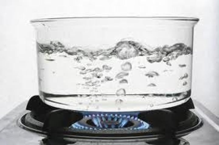 <p>Change of state from a liquid to a gas (occurs at a fixed temperature known as the boiling point)</p>