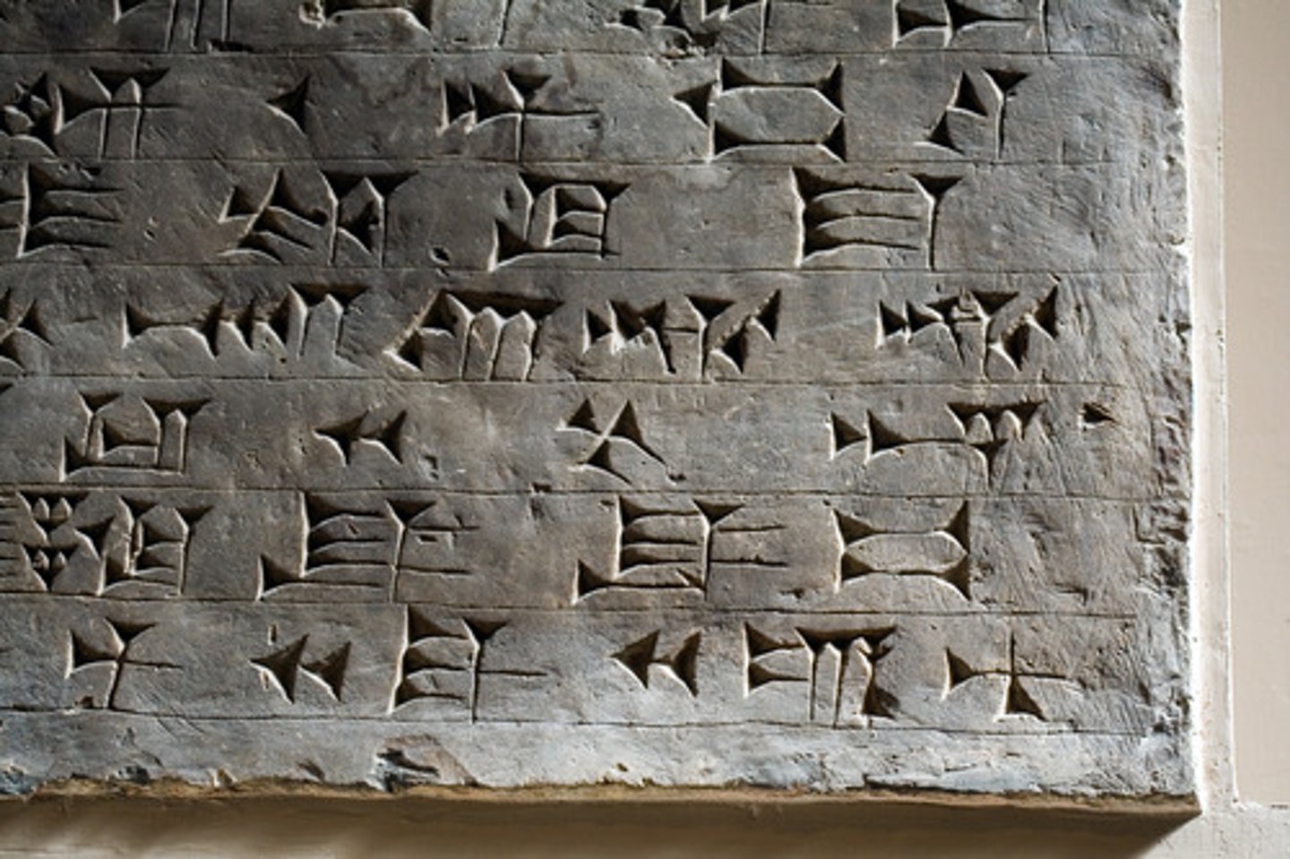 <p>One of the first written languages known: A system of writing in which wedge-shaped symbols represented words or syllables. It originated in Mesopotamia and was used initially for Sumerian and Akkadian but later was adapted to represent other languages of western Asia.</p>