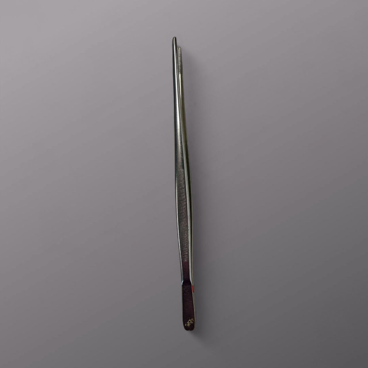 <p>Smooth dressing forceps </p>