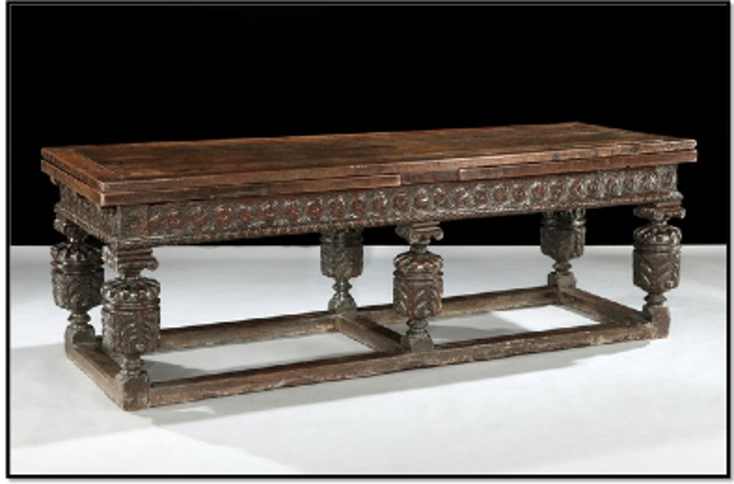 <p>very long table</p><p>bulbus support</p><p>open stretcher around</p><p>gadrooning</p><p>massive and rectilinear</p>