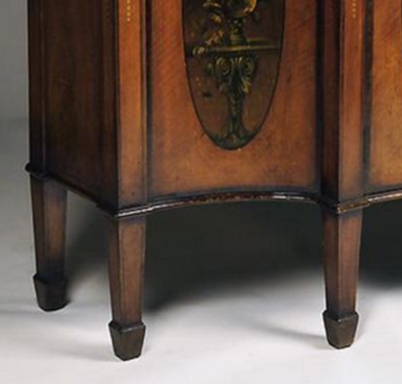 <p>Short, broad, downward-tapering foot attached to the bottom of a piece of case furniture</p>