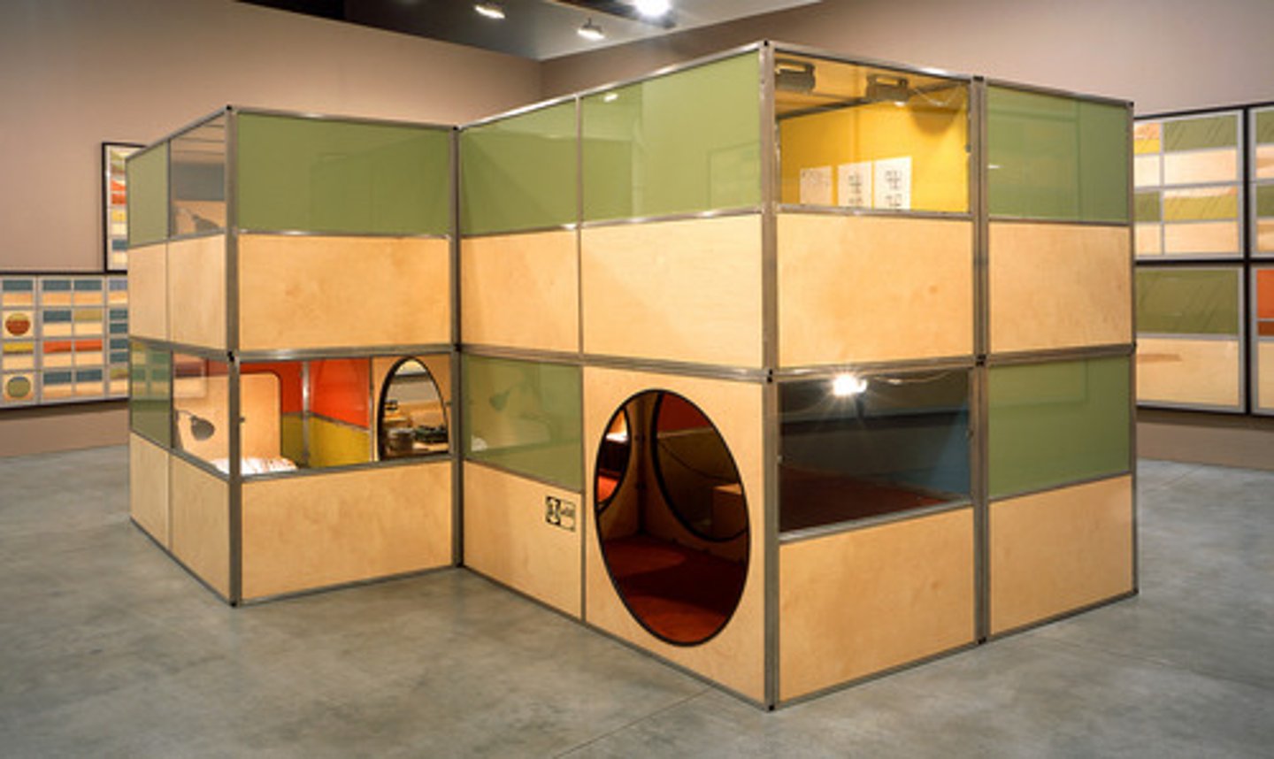 <p>Title: A - Z Cellular Compartment Units</p><p>Time: 2001.</p><p>Known for:</p><ul><li><p>A series of <strong>modular, self-contained living units</strong> designed to challenge ideas about <strong>personal space, comfort</strong>, and <strong>individual autonomy</strong>. Each unit, which could be used as a <strong>miniature living space</strong>, was designed with functional compartments for different activities like sleeping, eating, and working.</p></li><li><p class="">Known for exploring alternative living arrangements and social systems, Zittel's work <strong>critiques modern consumerism </strong>and<strong> the societal pressure to accumulate material goods </strong>and <strong>personal possessions</strong>.</p></li></ul><p></p>
