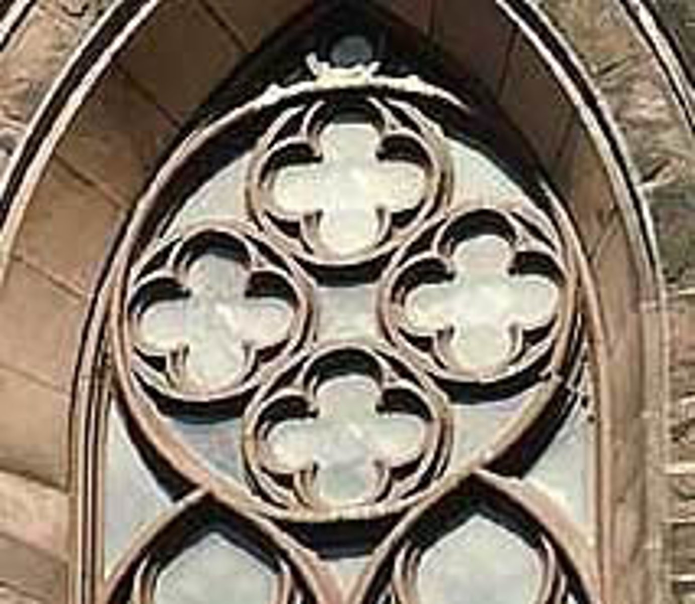 <p>A design element made of four symmetrical lobes or foils that resemble the petals of a flower. The symbol represented the four Gospels.</p>
