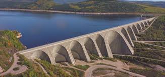 <p>dams - constructed to hold back water and control river flow. its benefits include flood control, HEP, water storage although it has a high cost, displacement of people, sediments trapped and dam collapse.</p><p>straightening - removing river meanders to increase flow speed and reduce flooding, its benefits are it helps water exist quickly although it increases flooding downstream and can lead to habitat loss and increased erosion. </p><p>levees (embankments) - built alongside rivers to prevent flooding, providing protection to adjacent land, like farmland and settlement. They can increase flood risk if overtopped or fail, and often require ongoing maintenance. </p><p>diversion spillways - structures designed to redirect excess water during floods, helping to manage flow and prevent overflow into populated areas or high value areas. Although it is expensive and may bring flooding to other areas.</p><p>dredging - the process of removing sediment and debris from river channels to deepen the channel and improve capacity. Benefits include, increases river capacity to carry more water and reduces flood risk in the short term. although temporary solution as sediment builds up again, disrupts aquatic habitats and is expensive and needs regular maintenance.</p><p>surge barrier - a structure used to protect against storm surges and floodwaters. Its benefits include protects large, low-lying areas from tidal and storm surge flooding, can be opened for ships and normal tidal flow and a long-term solution for flood risk. Although it isextremely expensive to build and maintain, requires constant monitoring and operation can affect local ecosystems and tidal flow.</p><p><span style="color: red">A system of levees, storm surge barriers and diversion spillways, protect low-lying land from the Rhine and Meuse rivers in Netherlands</span></p>