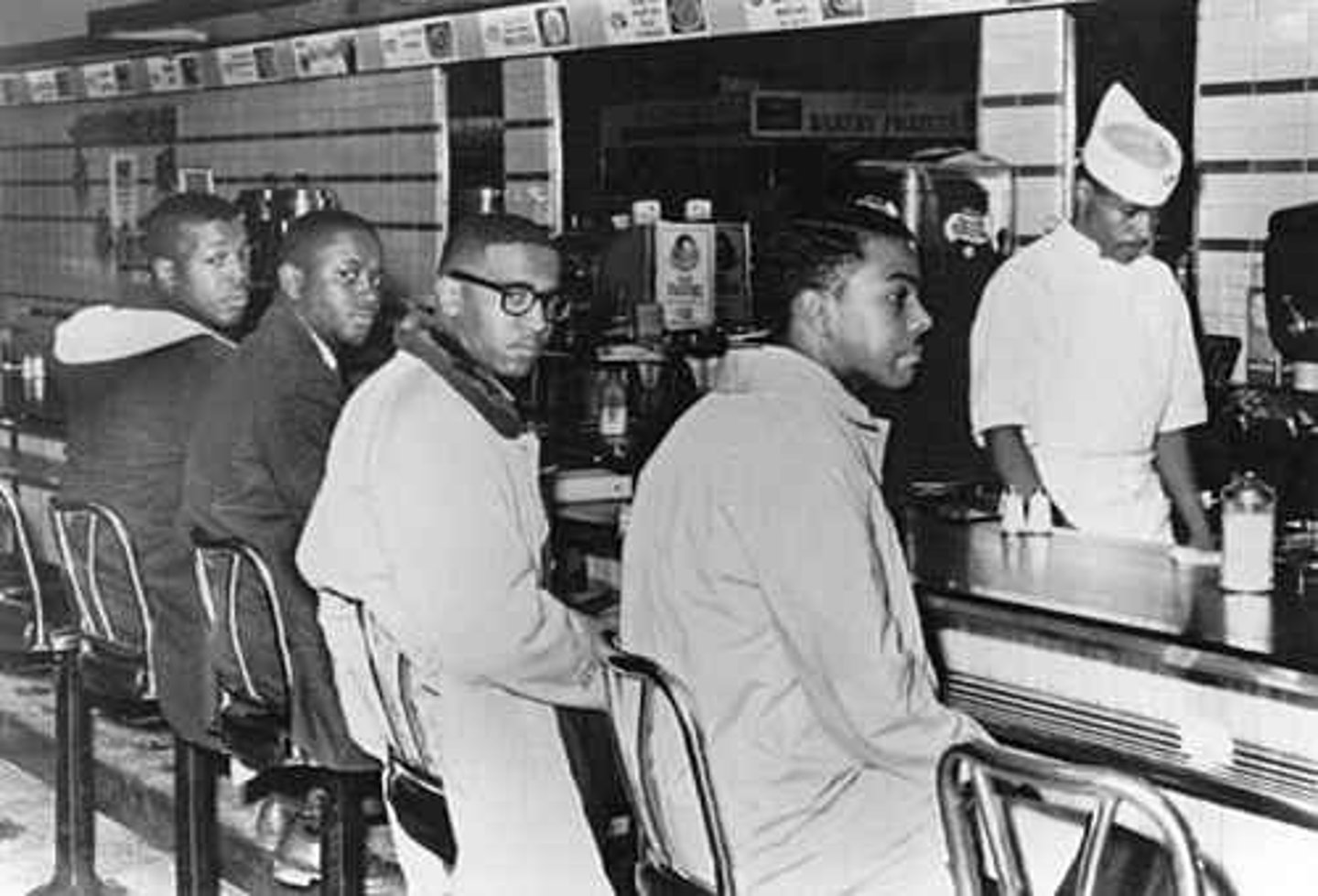 <p>Black students politely order food from restaurant, not served, sat in place for days, gathering supporters</p>