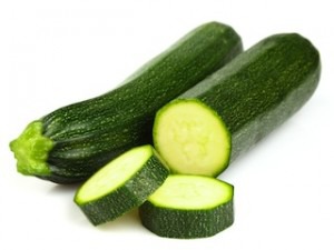 ranges from yellow - green - light green in color. It is long and narrow with a short stem / bulb at the top.