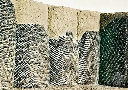 <p>a surface decorated by pressing pieces (usually colored and of conical shape) of stone or baked clay into damp plaster</p>