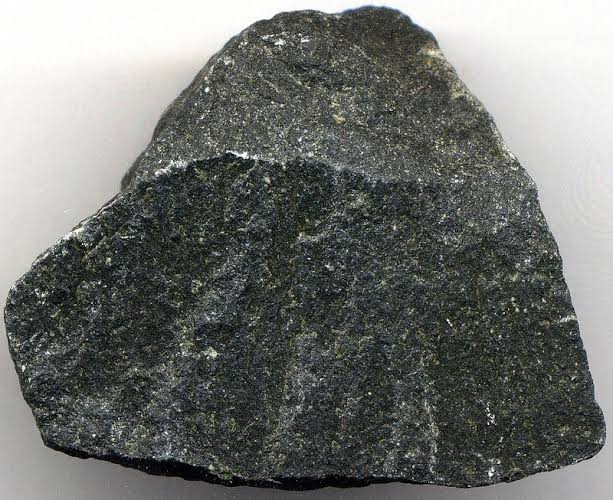 <p>Identify the igneous rock, its texture, and composition</p>