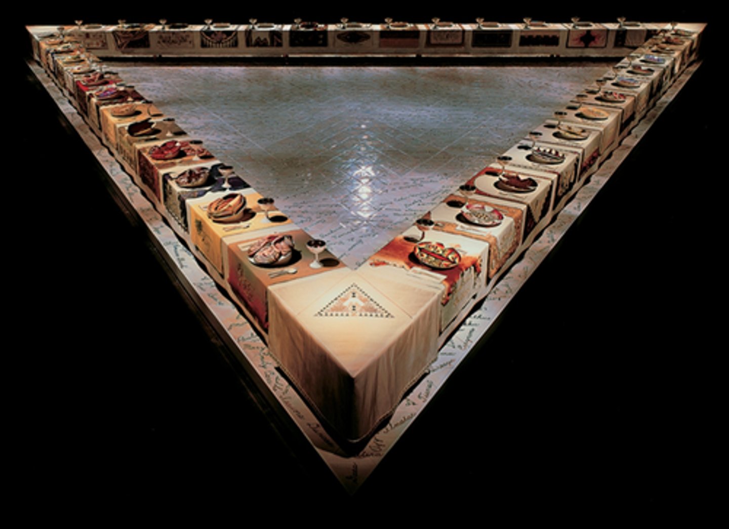 <p>Judy Chicago (Feminism)</p><ul><li><p><strong>1 Story:</strong> Monumental banquet table celebrating women’s history.</p></li><li><p><strong>2 Changes:</strong> Elevates “craft” to high art—directly challenging modernist hierarchies (Joselit).</p></li><li><p><strong>3 Context:</strong> Feminist recovery of erased histories; identity politics roots.</p></li><li><p><strong>4 New Approaches:</strong> Collaborative labor and decorative media as radical feminist strategy.</p></li></ul><p></p>