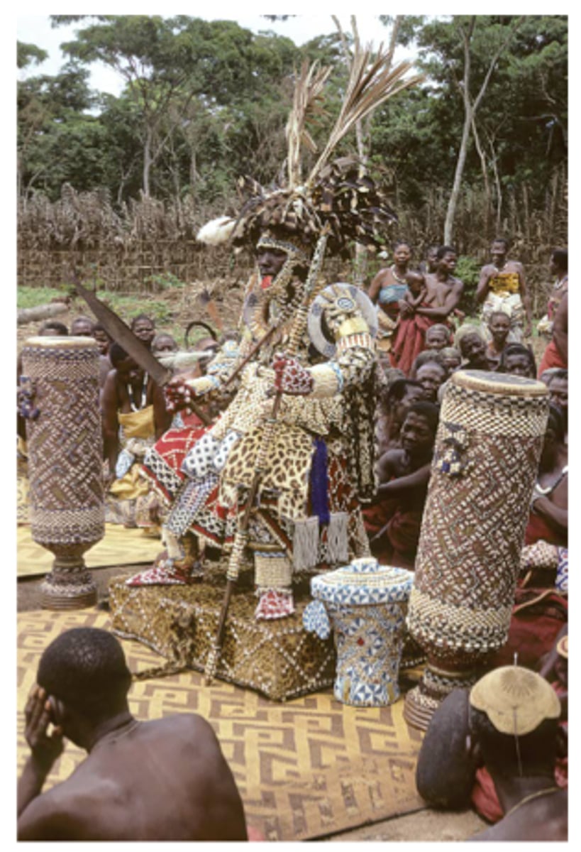 <p>Kuba Nyim (ruler) Kot a Mbweeky II in state dress with royal drum in Mushenge, Congo</p>