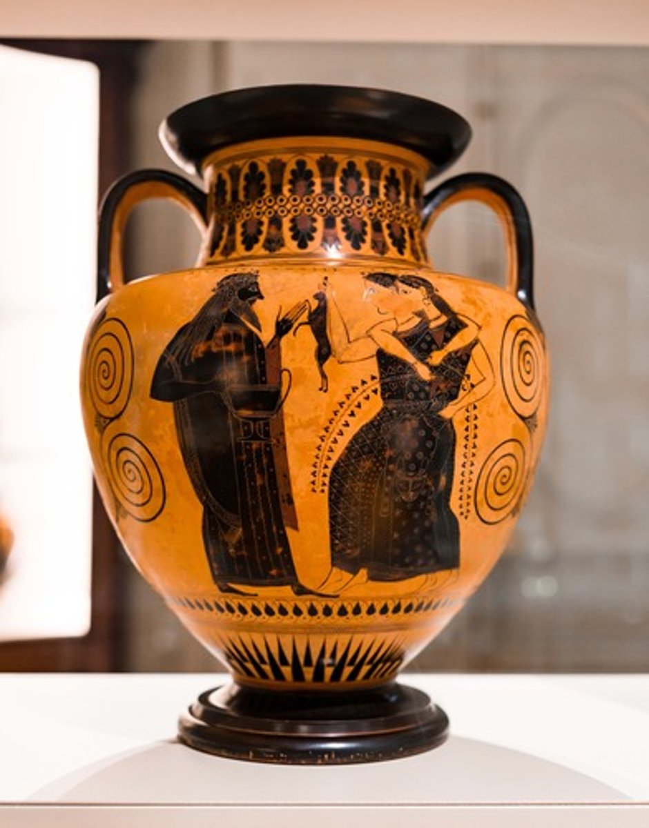 <p>Who The Amphora depicting Dionysos and Nymphs was created by the Amasis Painter1, an artist from the ancient Greek city-state of Athens1.</p><p>What The Amphora is an Attic black-figure neck amphora2. It depicts a mythological, mundane snapshot of Dionysus and two of his female followers, The Maenads, who are shown to be in the middle of offering the god a hare and a fawn2.</p><p>Where The Amphora is now housed in the Bibliotheque Nationale at Paris2.</p><p>When The Amphora dates back to around 540-535 BCE2.</p><p>Why The Amphora is interesting and important for several reasons:</p><p>Artistic Significance: The vase is a paragon of Archaic vase painting with its palmette compositions, mythological depictions, and use of the Black figure technique2. The fine incisions in Dionysus' hair would have been created through the use of a needle, whereas his garments and the panther skin dresses of The Maenads, which was cleverly used by The Amasis Painter as a homage to Dionysus' symbol, the panther, would have been delineated through the black clay pigment2.</p><p>Cultural Significance: The vase depicts Dionysus and The Maenads. Dionysus is one of the Twelve Olympians who was the god of wine and fertility. The Maenads are female worshippers of Dionysus2.</p><p>Historical Significance: The Black-Figure Technique was born in Corinth in 700 BCE. The movement into naturalism and the portrayal of everyday life with the use of mythological figures also began to dominate the art scene, particularly in the Archaic era (699 - 480 BCE)2.</p>