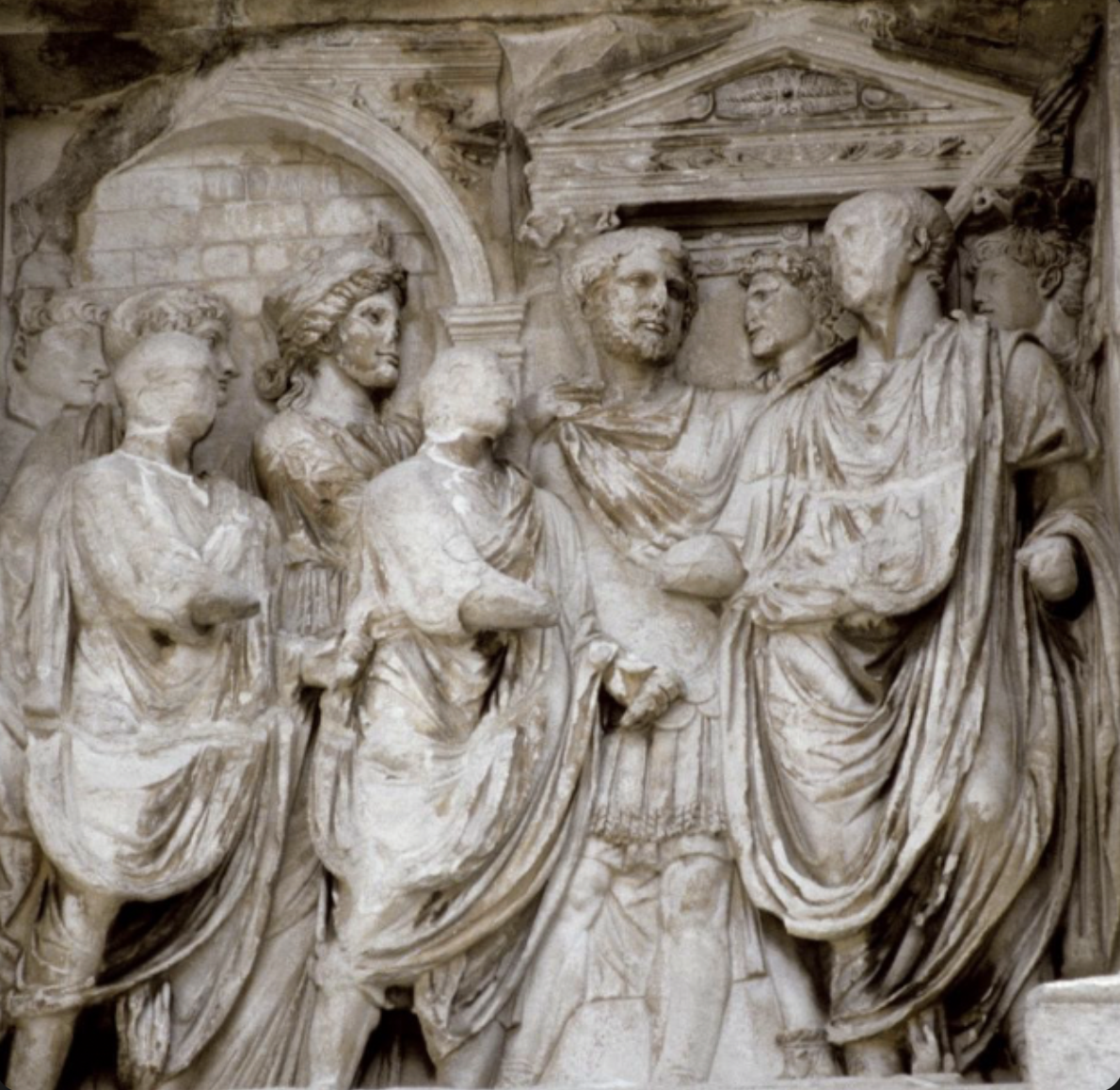 right attic relief, coming in after Dacian victory. trajan was adopted by miraba, and Hadrian will be adopted by trajan