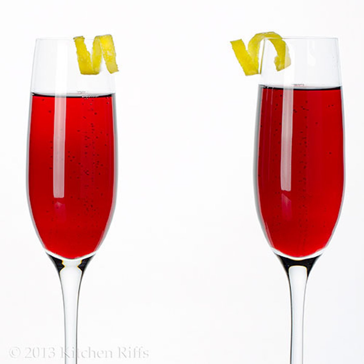 <p>- Built<br>- Wine glass chilled<br>- 0.5 oz Creme de Cassis<br>- Fill w/ white wine<br>- Garnish: lemon twist</p>