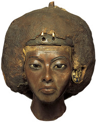 <p>-Yew wood with gold, lapis lazuli, silver, alabaster -Akhenaten co-ruled with his mother and wife -Mother was not royal blood, was demoted when her husband died -Re-promoted when Akhenaten became pharaoh -He elevated her to the status of goddess -Amarna period (not idealized, has wrinkles)</p>