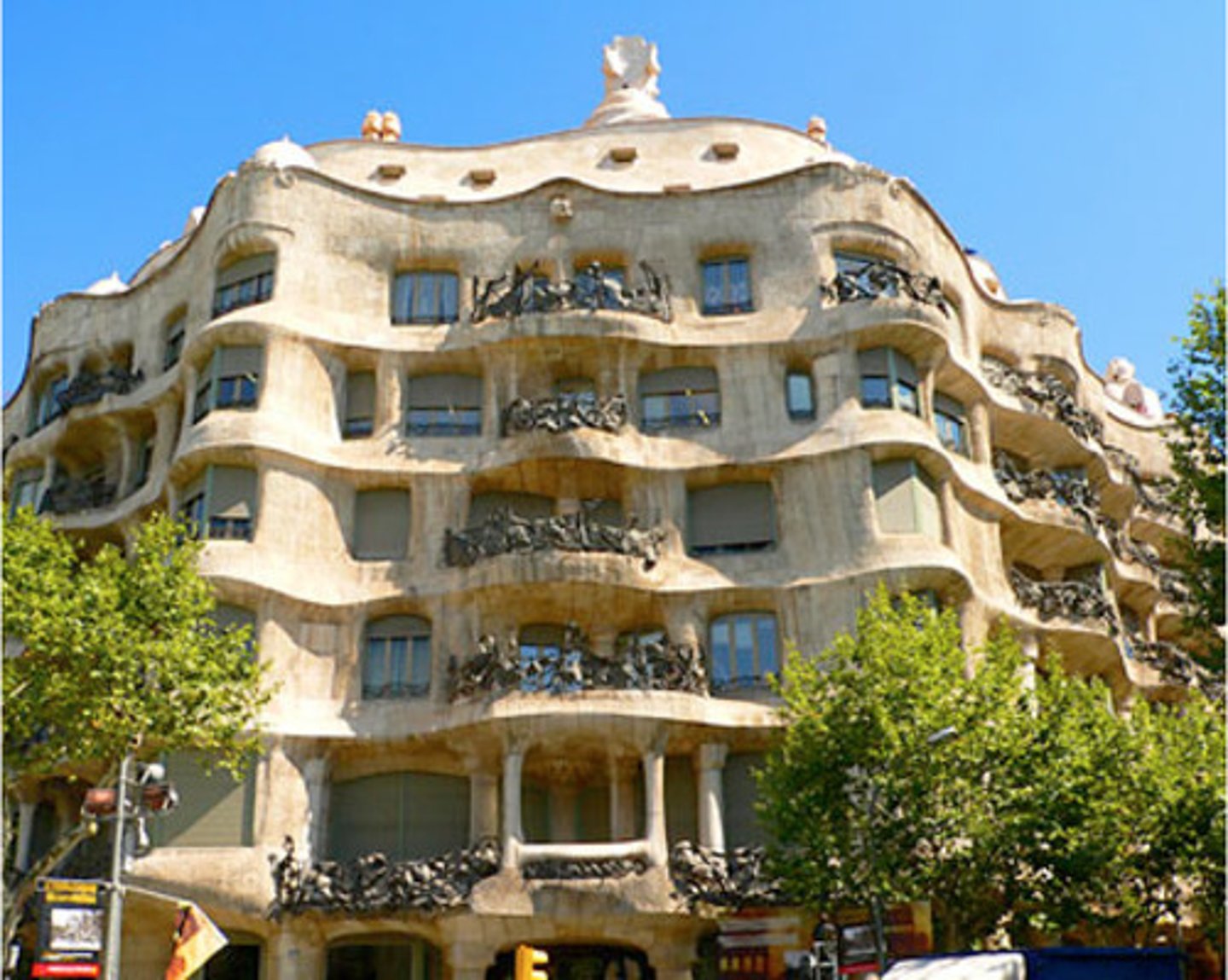 <p>Designed by <strong>Antonio Gaudí; </strong>informally known locally as<span style="color: red"><strong> La Pedrera (the rock quarry).</strong></span> It is a large, six-story apartment house built around open courtyards.</p>