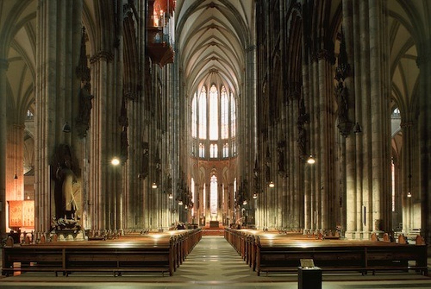 <p>What structure resembles Amiens, with its eastern portion being a direct copy of a Northern European cathedral, and the choir rising to 150 feet, appearing even taller?</p>