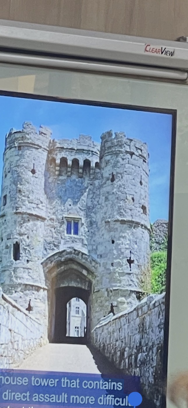 <ol><li><p>is a fortified gatehouse tower that contains a series of defences to make a direct assault more difficult.</p></li></ol><p></p>