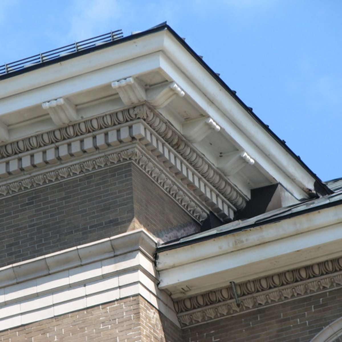 <p>A cornice is a decorative molding that projects horizontally from the top of a building or wall</p>