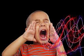 Longitudinal waves that cause particles to vibrate parallel to the direction of wave travel