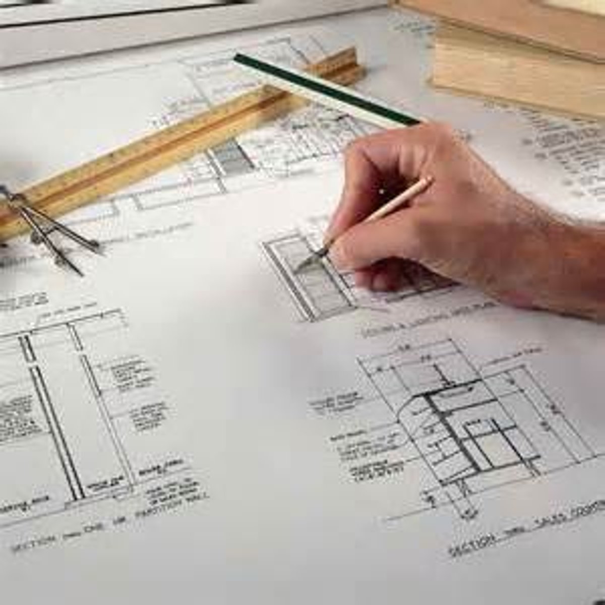 <p>designs buildings and plans how they will be built</p>