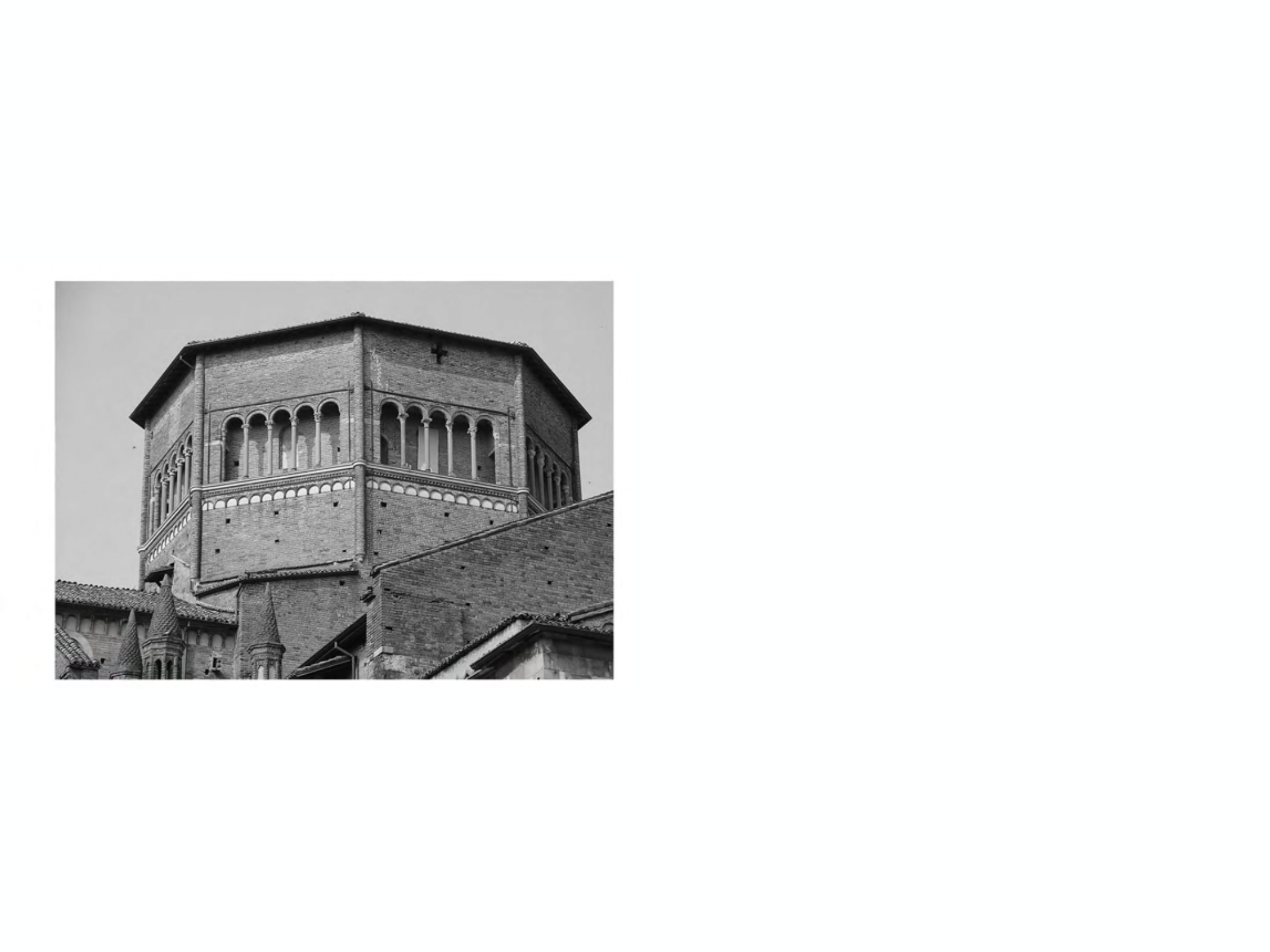<p>A structure consisting of vertical walls covered by a roof placed over the crossing of a church and built to protect the interior dome or vault from accidental loads.</p>