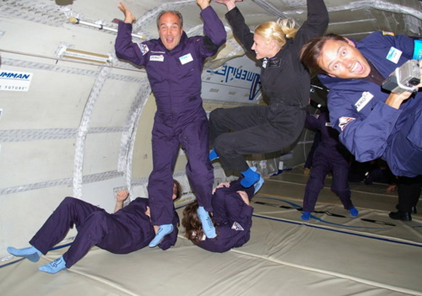 <p>a force that exists between any two objects that have mass (related word: gravitational)</p>
