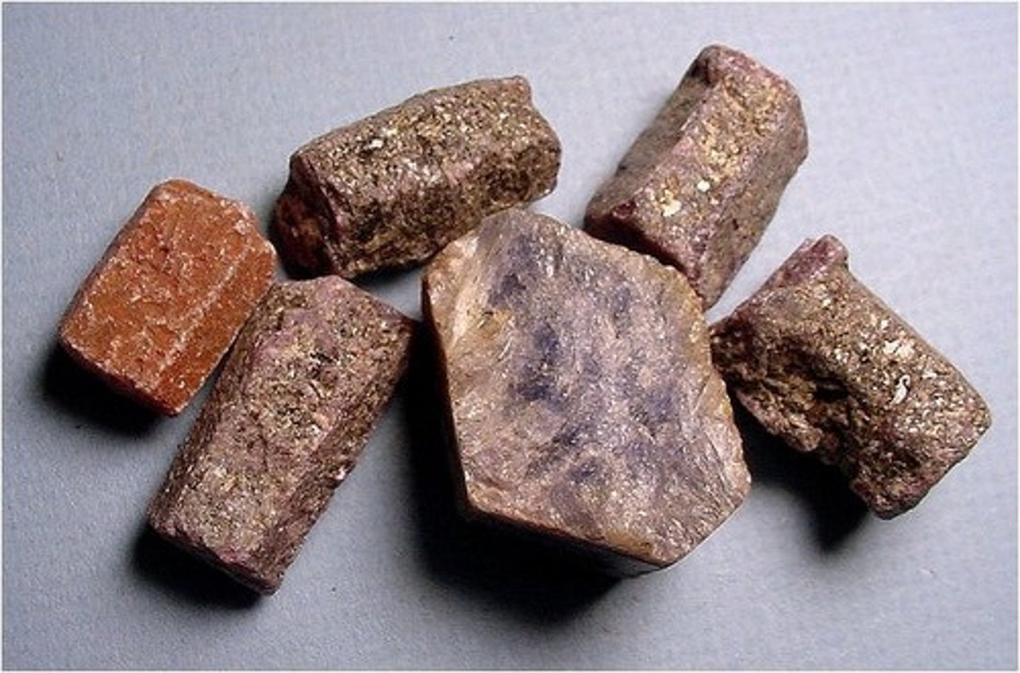 <p>Mineral<br>Color: Gray to Brown<br>Streak: Colorless<br>Luster: Vitreous<br>Cleavage: None<br>Hardness: 9<br>Specific Gravity: 3.9-4.1</p>