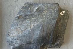 <p>metamorphic,  phyllitic slatey, fine grained,  pyrite Quartz staurolite andalusite can be found inside</p>