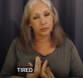 point both hand to the heart and then slump them down so that the pinkys are touching the chest. 