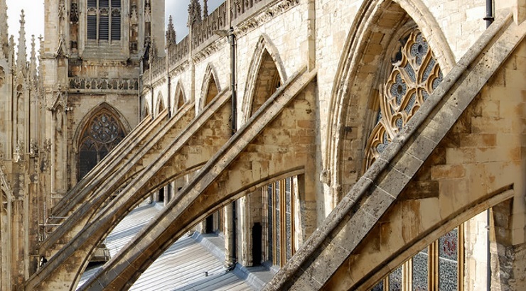 <p>flying buttress (gothic architecture fancy support beams)</p>