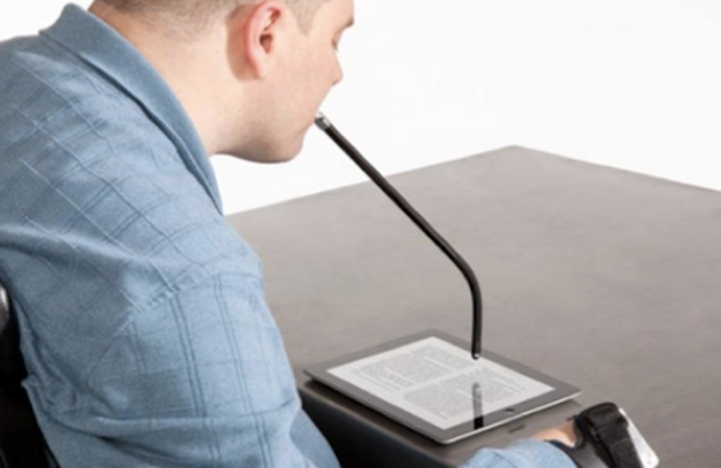 <p>Mouth stick for quadriplegics </p><p>- can help with turning pages, drawing, typing, and other functions </p>