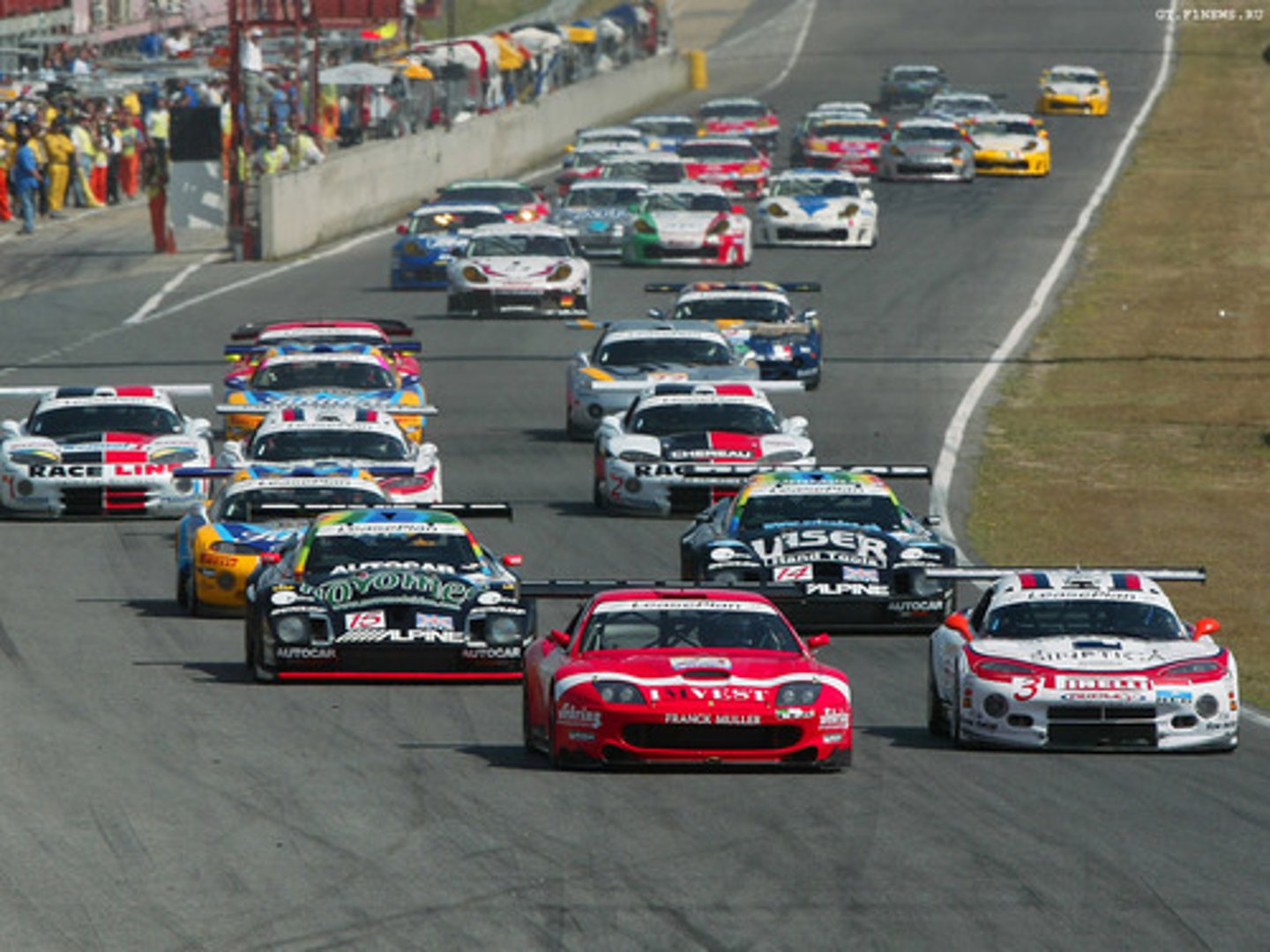 <p>to (do) car racing</p>