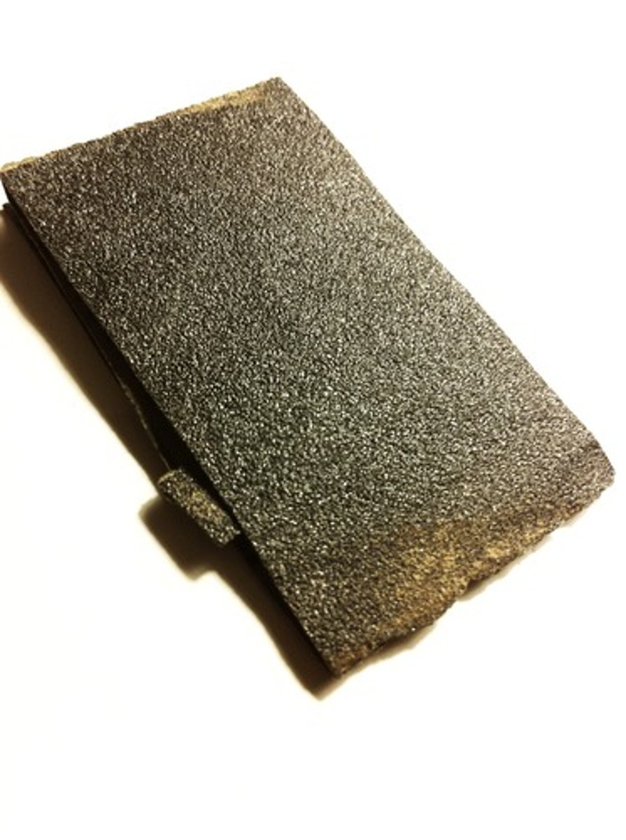 <p>the scraping, scouring or rubbing action of materials being carried by a moving feature suchs as a river, glacier or wave, which erode rocks</p>