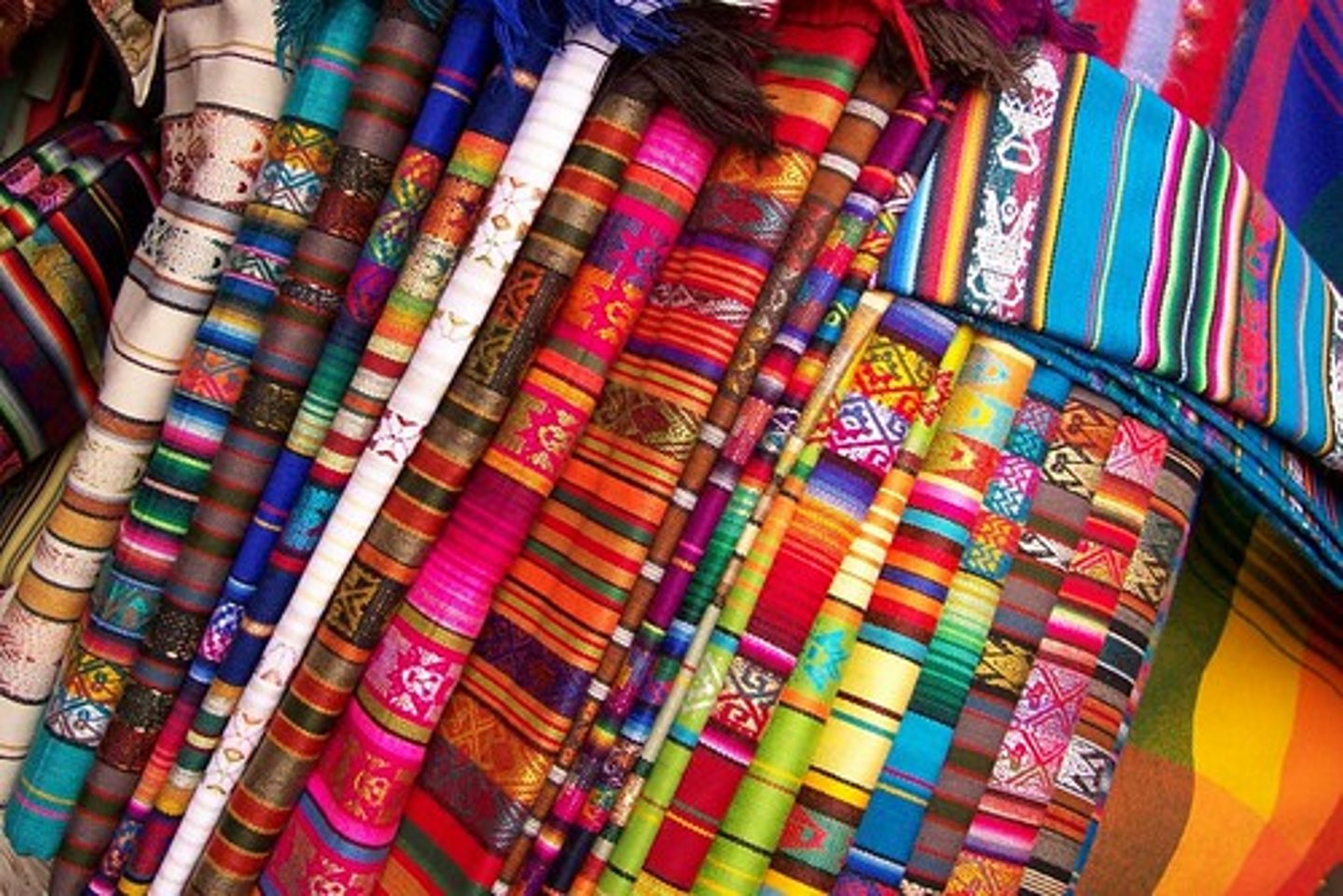<p>a type of cloth or woven fabric often sold on trade routes</p>