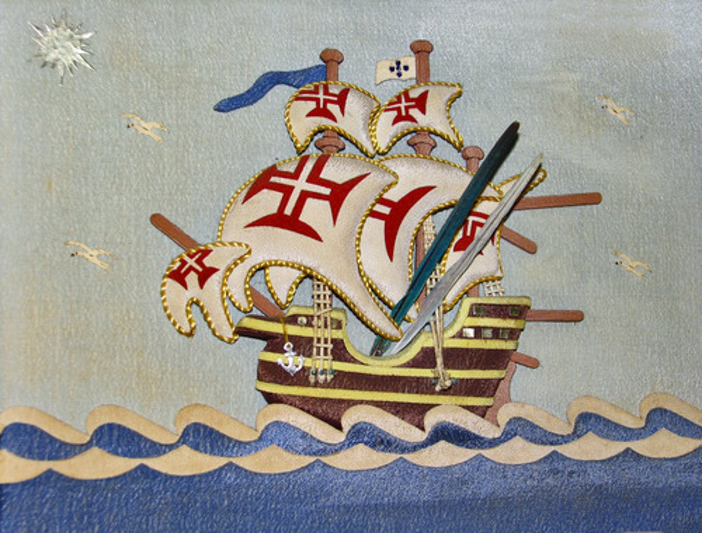 <p>A small vessel with a high deck and three triangular sails.</p>