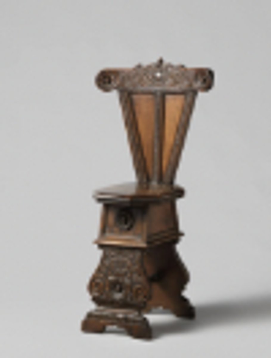 <p>What stool has carved walnut, often elaborately ornamented wood legs, and a partly gilt back, with front support carved in strapwork and terminals?</p>