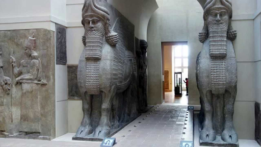 <p>Lamassu from the citadel of Sargon II,</p><ul><li><p>-Dur Sharrukin Neo-Assyrian.</p></li><li><p>c. 720-705 B.C.E.</p></li><li><p>Alabaster</p></li><li><p>The Assyrian lamassu sculptures are partly in the round, but the sculptor nonetheless conceived them as high reliefs on adjacent sides of a corner. The combine the front view of the animal at rest with the side view of it in motion. Seeking to present a complete picture of the lamas from both the front and the side, the sculptor gave the monster five legs- two seen from the front, four seen from the side.</p></li></ul>