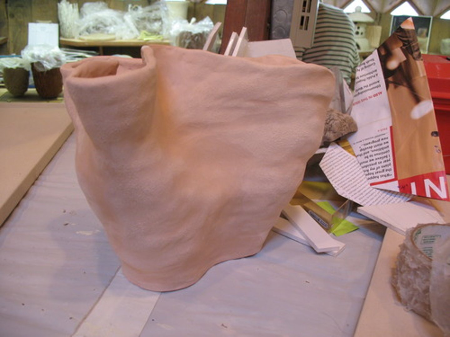<p>Pottery that has been fired but not yet glazed.</p>