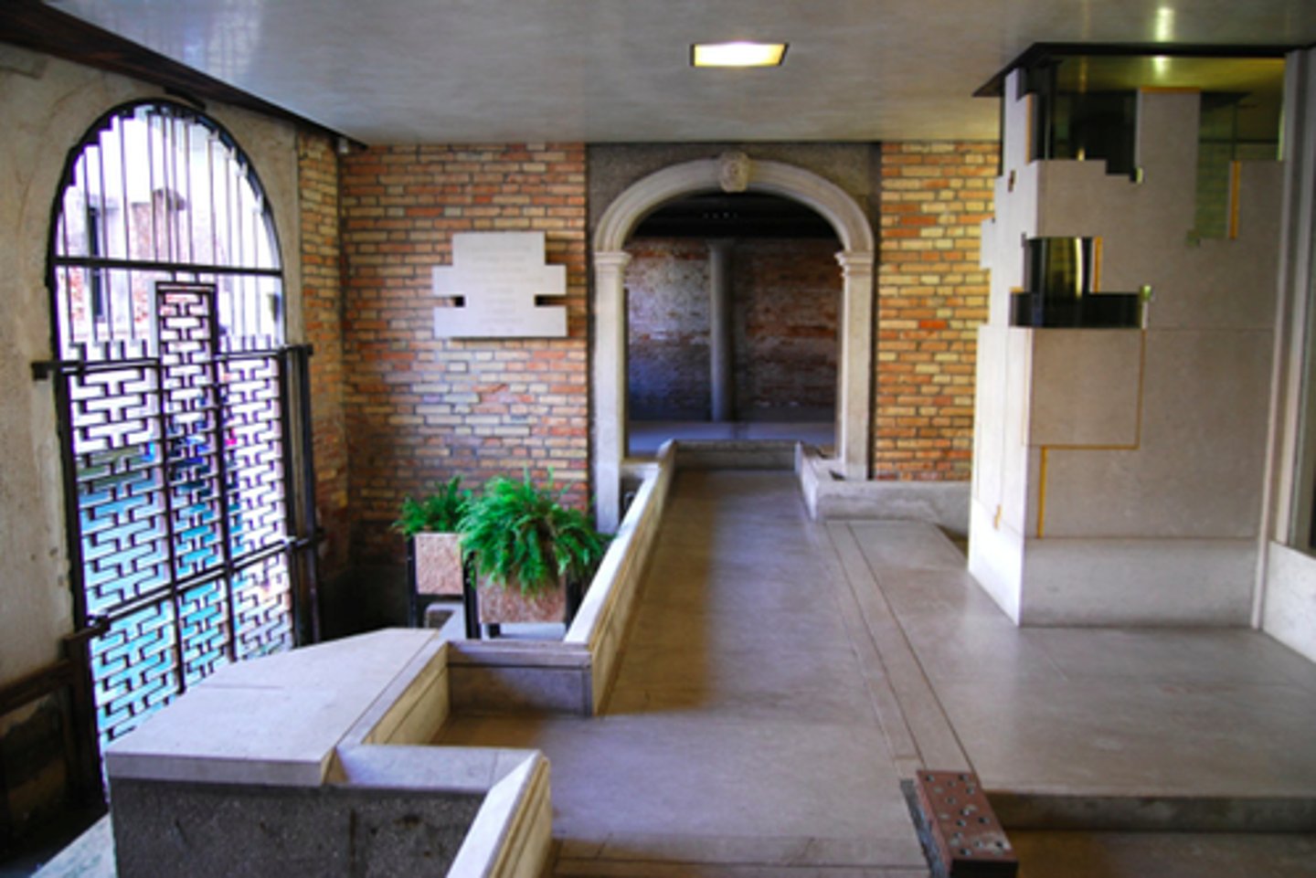 <p>Renovation project combining expensive and cheap materials.</p><p>Entrance it at a higher plane for a gondola, with stairs leading down to open first floor to allow water inside due to frequent floods in Venice.</p>