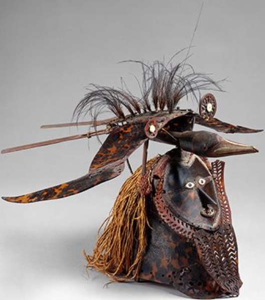 Artist/Culture: Torres Strait Islander
Medium: Turtle shell, wood, fiber, feathers, shells