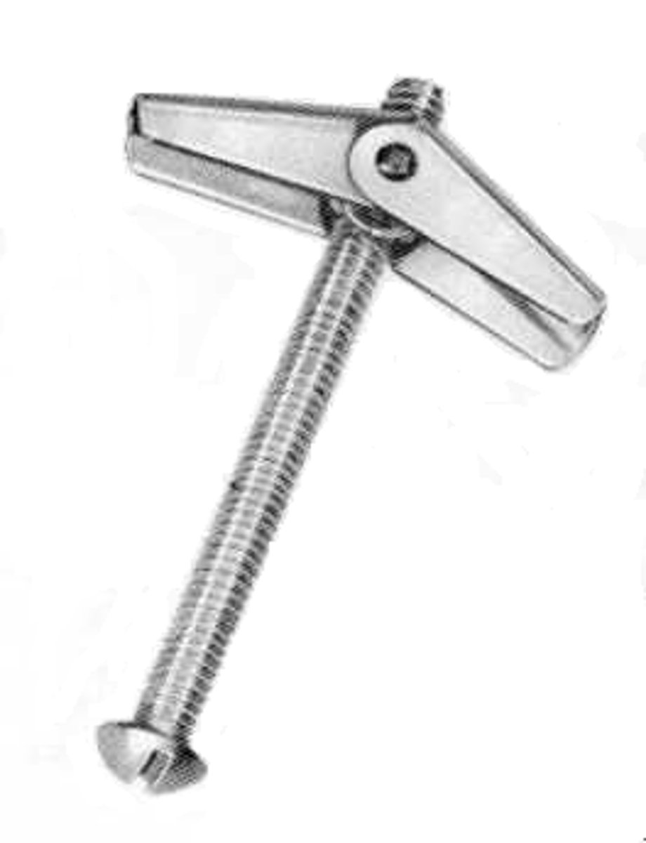 <p>An anchor bolt having two hinged wings that close against a spring when passing through a predrilled hole and open as they emerge to the inner surface of a hollow wall.</p>