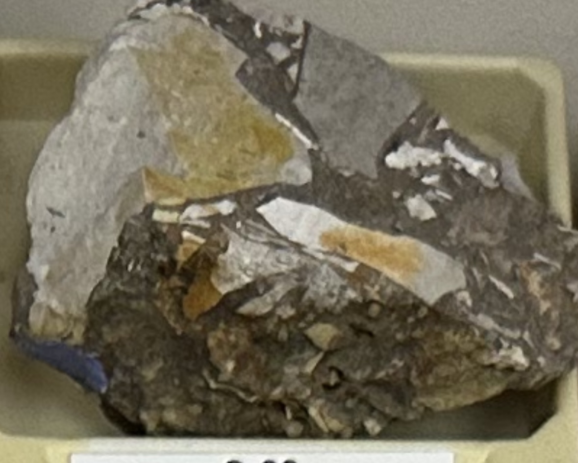 <p><strong><u>CLASTIC/DETRITAL</u></strong></p><p><strong>GRAIN:</strong></p><p>size— &gt;2mm, shape— angular grains, sorting— poorly-sorted</p><p><strong>HCI: </strong>NO reaction</p><p><strong>ENVIRONMENT:</strong> continental (alluvial fan)</p><p><strong>CEMENT:</strong> calcite</p><p><strong>POROUS:</strong> yes</p><p><strong>MINERAL(S): </strong>quartz, feldspar, rock and/or clay minerals<br><strong>OTHER:</strong> very chunky like conglomerate but sharper/more angular, generally poorly sorted fragments</p>