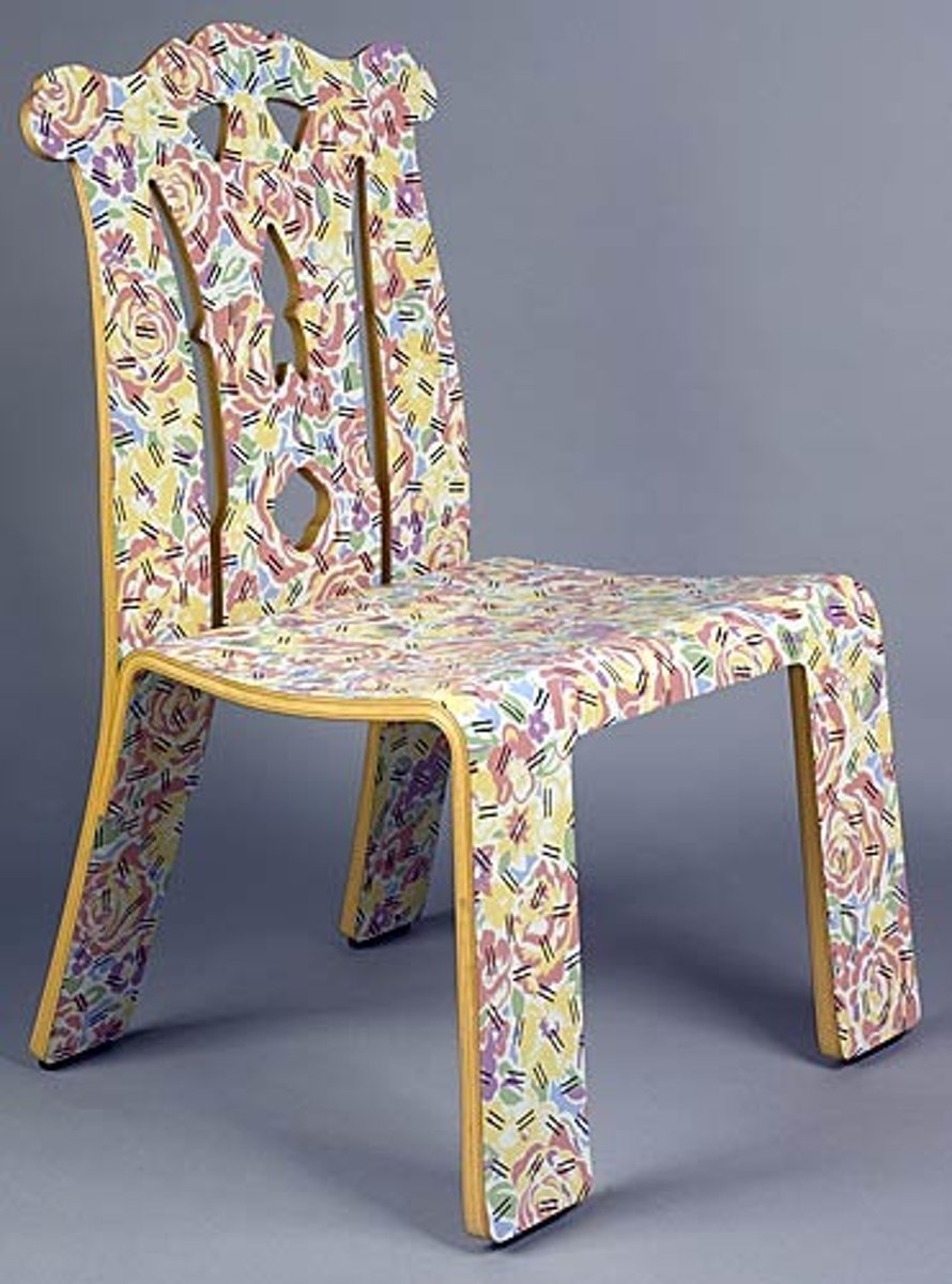 <p>This whimsical design of modern molded plywood construction has a back cut out in a pattern suggesting the design of eighteenth century Chippendale furniture. Designed by Robert Venturi.</p>