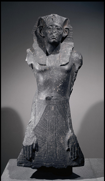 <p>Statue of Senwosret III in devotional pose, found in the mortuary temple of Nebhepetre-Montuhotep, grandiorite, ca. 1878-1841 (Middle Kingdom, Dynasty 12)</p>