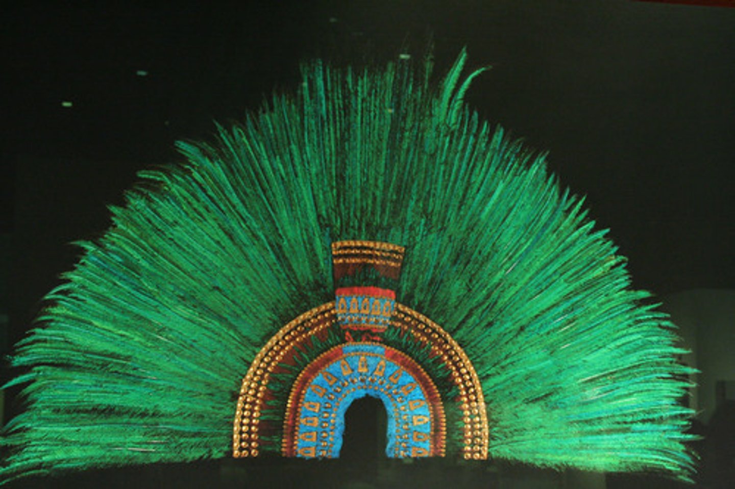 <p>AZTEC, feathers+gold<br><br>Belonged to Moctezume II<br>Green feathers come from QUETZAL BIRDS! SACRED!!<br>MANY FEATHERS. 400= symbolizes eternity<br>Given as a sign of respect/goodwill or taken forcefiully, idk</p>