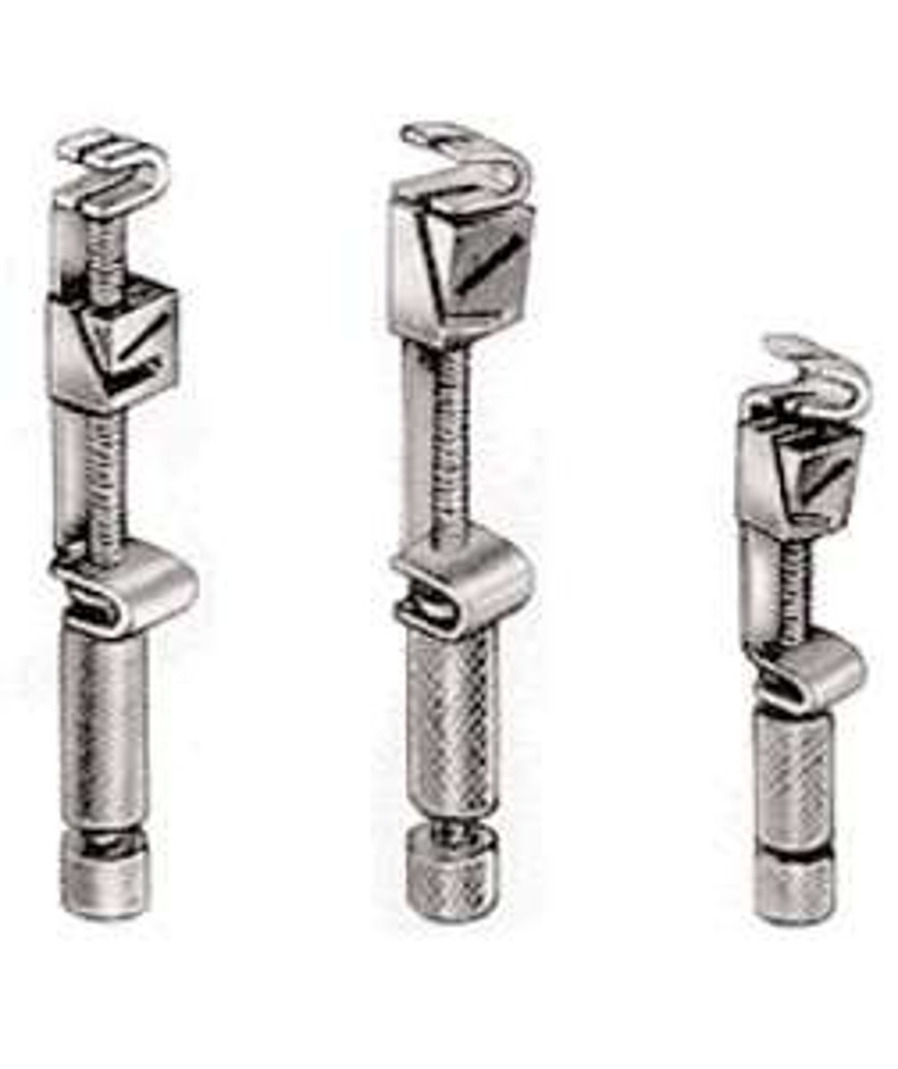 <p>is commomnly used to hold a matrix band in place during a class II restoration</p>