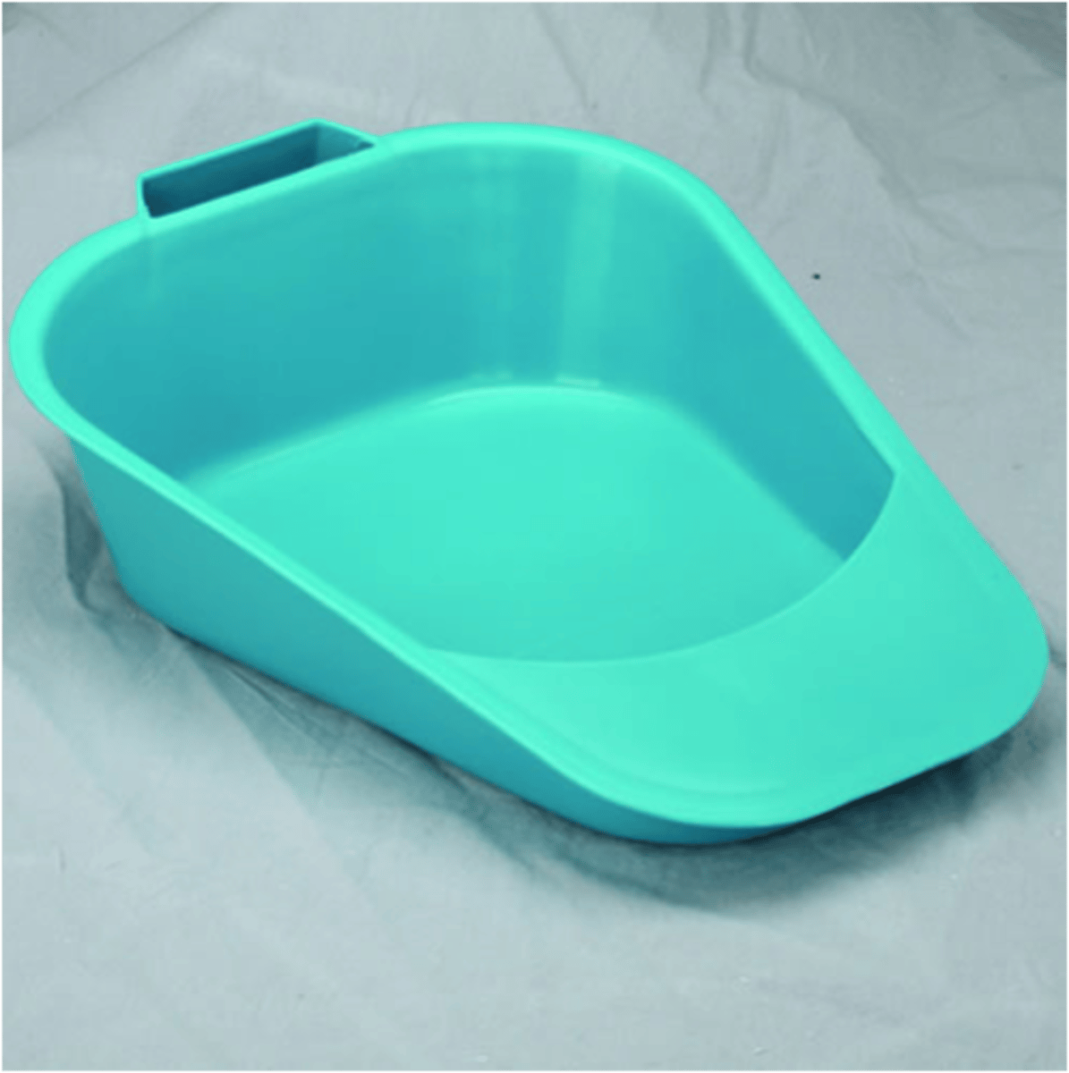<p>used for patients who cannot elevate the pelvic area.</p><p>It is positioned under the perineum, with the handle on the end closest to the knees.</p>