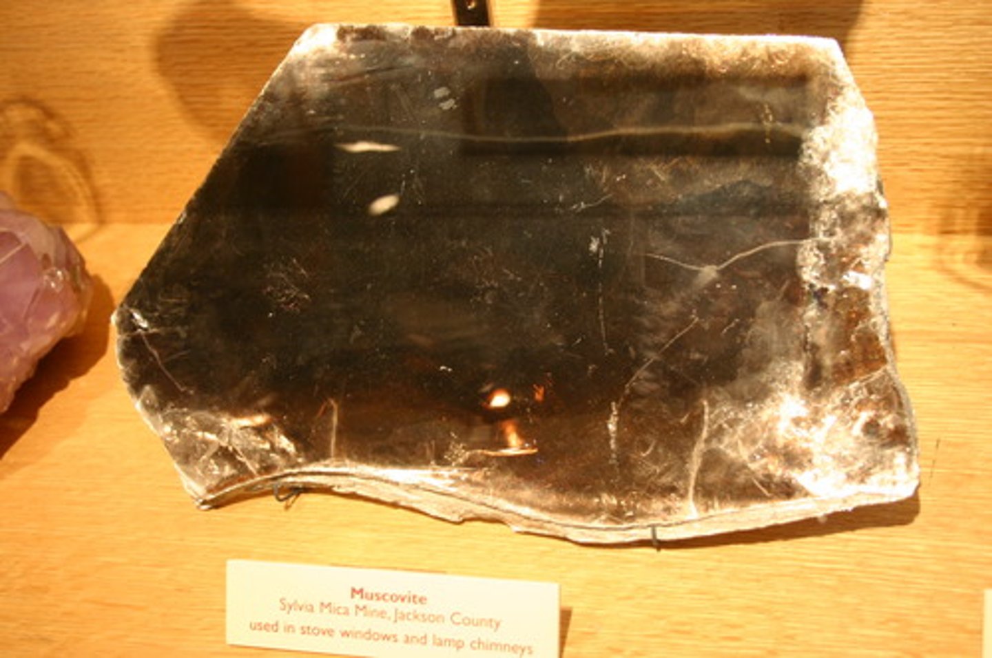 <p>Rock-forming mineral; colorless to silvery white, one perfect cleavage, forms sheets, hardness 2-2.5 (soft)</p>