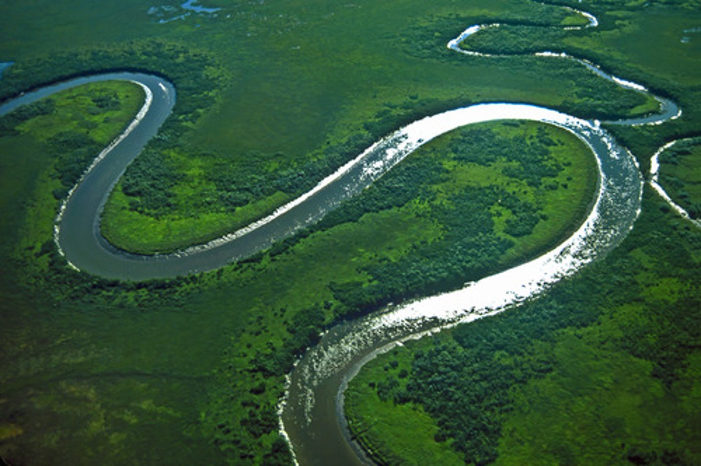 <p>When rivers bend or make winding curves</p>