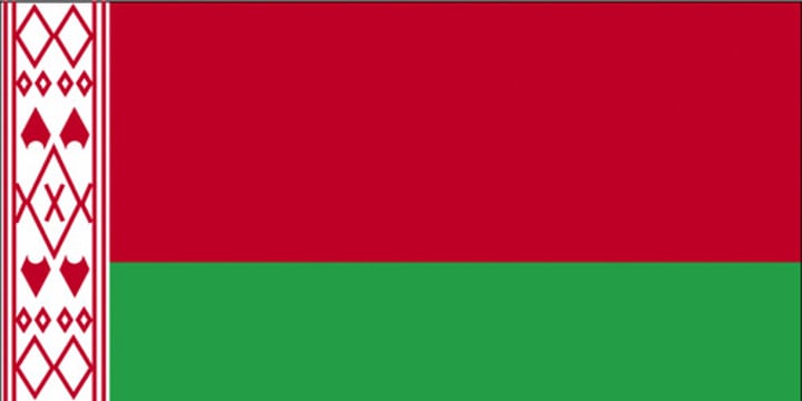 <p>No official interpretation for the colors of the flag.</p><p>Red = freedom and the sacrifice of the nation's forefathers.</p><p>Green = life.</p><p>Red-on-white traditional decorative pattern.</p>